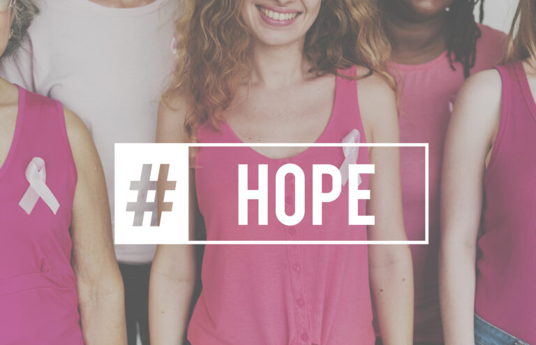 Hope, faith, dream, trust, belief, and inspire words symbolizing strength and positivity in the fight against breast cancer.